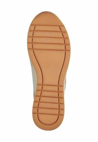 Suola di scarpa in materiale gommoso marrone chiaro, caratterizzata da scanalature orizzontali per la trazione e un'etichetta di dimensione "37" sul fondo.