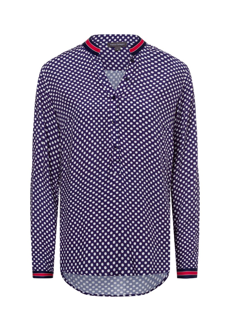 Camicia a maniche lunghe di colore blu navy con pois bianchi. Presenta una mezza abbottonatura e dettagli a righe rosse e bianche sul colletto. Tessuto leggero.