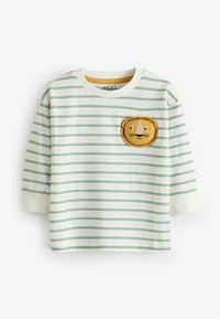 Camiseta de manga larga para niño pequeño, blanca con rayas verde claro y un pequeño parche bordado con la cara de un león en el pecho.