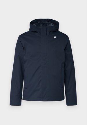 Dark navy waterproof jacket with a hood, front zip closure, two side pockets, and a small white logo on the chest. Smooth fabric texture.