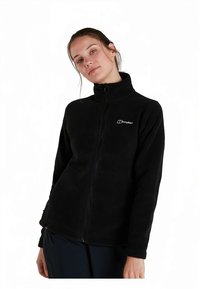 Fekete polárdzseki magas gallérral és végigfutó cipzárral. Kis logó található a bal felső oldalon. Puha textúrájú, testhez simuló kialakítás.