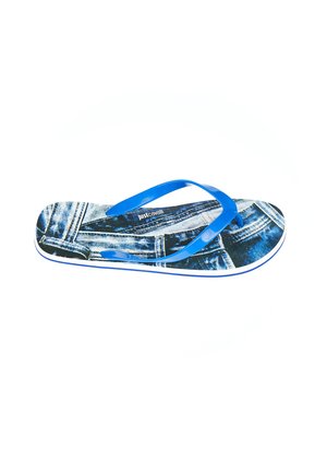 Blue flip-flop with a denim-like pattern on the footbed; features blue straps and a white trim. Brand logo visible on footbed.