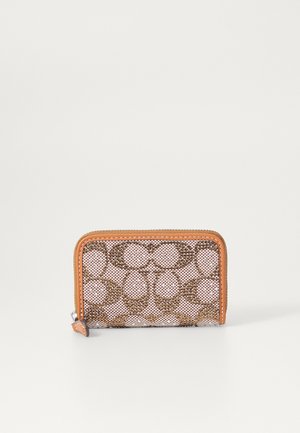 Compact wallet featuring a pink mesh design with brown circular patterns and an orange leather trim. Zippered closure with a small tab.