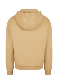 Beige mikina s kapucí zobrazená ze zadní strany, s dlouhými rukávy a elastickými manžetami a spodním lemem.