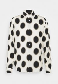 Langarmhemd aus glattem Stoff mit einem großen Muster aus schwarzen und cremefarbenen Punkten, mit einem Button-Down-Kragen und einer Vorderknopfleiste.