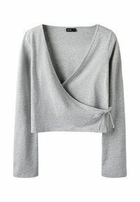 Gray long-sleeve wrap top in soft, stretchy fabric. Features a v-neckline and tying detail on the side. Cropped design.