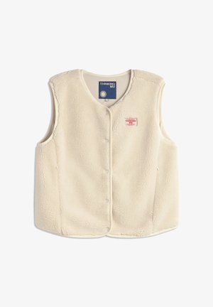 Crèmekleurige mouwloze fleece vest met drukknoopjes en een klein rechthoekig rood logo op de linkerkant van de borst.