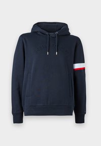 Mørkeblå hettegenser med frontlommer, "HILFIGER" preget på brystet, justerbar snor i hetten, og hvit og rød stripe på venstre erme.
