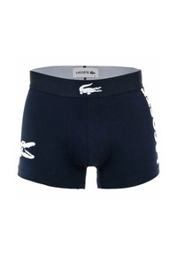 Boxer-briefs navy en coton doux, avec un logo de crocodile blanc et le nom de la marque sur le côté, et une ceinture élastique.