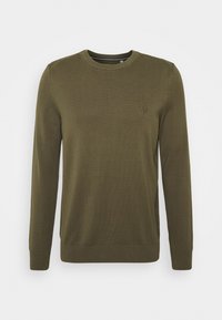 Pull olive en tricot côtelé, avec des manches longues, un col rond et un petit logo sur la poitrine. Texture lisse.