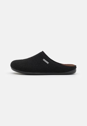 Black felt slipper with a rounded toe, smooth black sole, and a subtle logo accent. Features a soft texture and slip-on design.