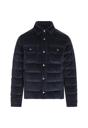 Mørkeblå kordfløyels pufferjakke med knappelukking foran, to brystlommer og spiss krage. Har en quilted tekstur og metallaksenter.