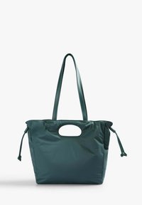 Ampio borsa a tracolla in nylon teal con manici allungati, un ritaglio rotondo sulla parte frontale, chiusure con coulisse e una texture liscia e opaca.