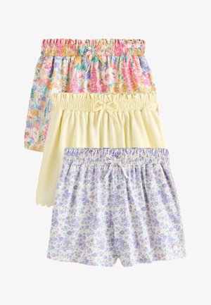 Tre par shorts med elastik i taljen og snører, én med blomster i lilla, én ensfarvet lys gul og én med flerfarvet blomsterprint.