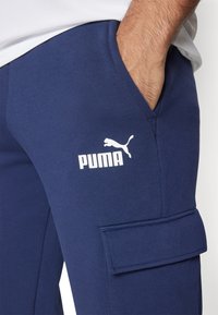 Puma CARGO PANTS - Pantalones deportivos - peacoat