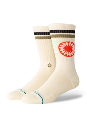 Cream cotton socks with black and olive stripes at the top and a red floral pattern. Features reinforced toe and ribbed texture.