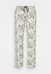Blumengemusterte Schlafanzughosen in Creme und Schwarz, gefertigt aus leichtem Stoff. Mit einem elastischen Bund und einem braunen Kordelzug.