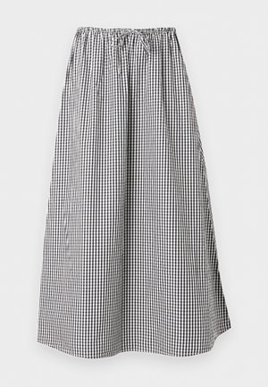 Jupe longue en ligne A avec motif vichy noir et blanc et taille élastique avec cordon de serrage.