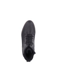 Bottines noires à talons, avec un extérieur en cuir lisse, un laçage à l'avant et une fermeture éclair sur le côté. Présente une doublure texturée et une semelle robuste.