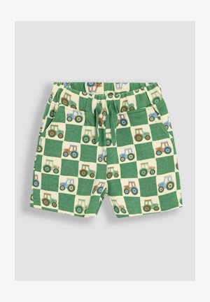 Vaikų šortai su žalia ir kreminėmis languotomis raštų, puoštomis mėlyno, rudo ir žalio traktoriaus iliustracijomis. Pagaminti iš švelnios medvilnės audinio.