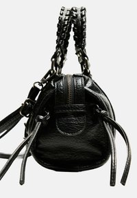 Black leather handbag with a round shape, braided straps, zip closure, decorative tassels, and smooth, textured surface.