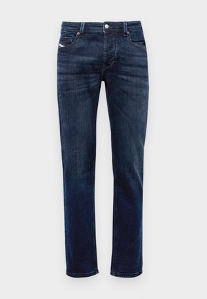 Dark blue denim jeans with a straight-leg cut, featuring a zip fly, five-pocket design, and subtle stitching details. Smooth texture.