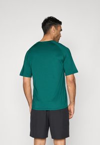 Champion TRAINING CREWNECK  - Sport T-shirt - dark green