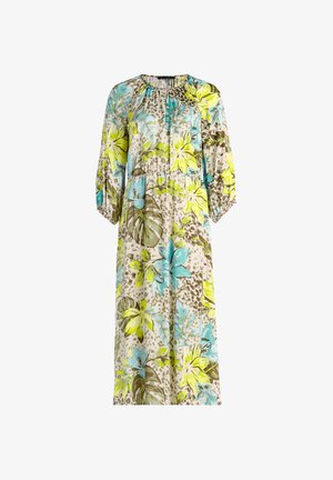 Robe midi à manches longues fleurie avec poignets élastiques, encolure ronde et motifs de feuilles tropicales jaunes, bleues et vertes sur fond beige.