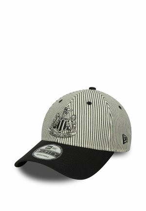 Black and white striped baseball cap with a curved brim, featuring an embroidered Newcastle United logo on the front and adjustable size.