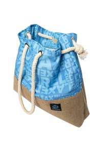 Blue and beige tote bag with rope handles, drawstring closure, and repeating "RELAXED" text pattern on blue fabric.