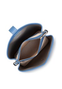 Blue leather handbag with a structured shape, featuring a zipper closure, beige interior, and a small pocket for organization.