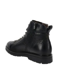 Bottine en cuir noir avec une finition texturée, dotée d'une fermeture éclair latérale, d'œillets en métal et de lacets. La semelle en caoutchouc offre adhérence et stabilité.