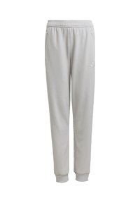Helle graue adidas Jogginghosen mit elastischem Bund, zulaufenden Beinen und gerippten Bündchen. Mit dezentem Logo-Stick auf dem linken Bein.