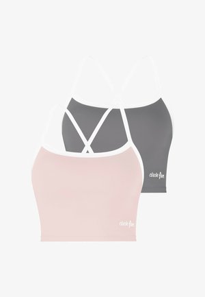 Zwei nahtlose Croptops mit dünnen gekreuzten Trägern, eines in Hellrosa und eines in Dunkelgrau, beide mit dem Text "circle five".