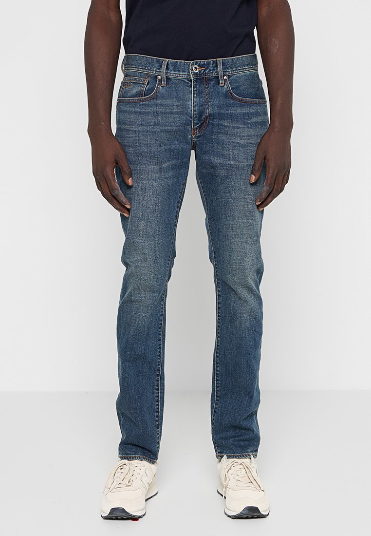 Armani Exchange Jeans Tapered Fit donkerblauw denim Armani Exchange Jeans Tapered Fit donkerblauw denim