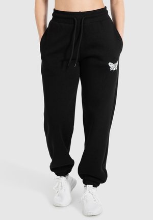 NALA CASUAL JOGGERS - Tracksuit bottoms - schwarz
