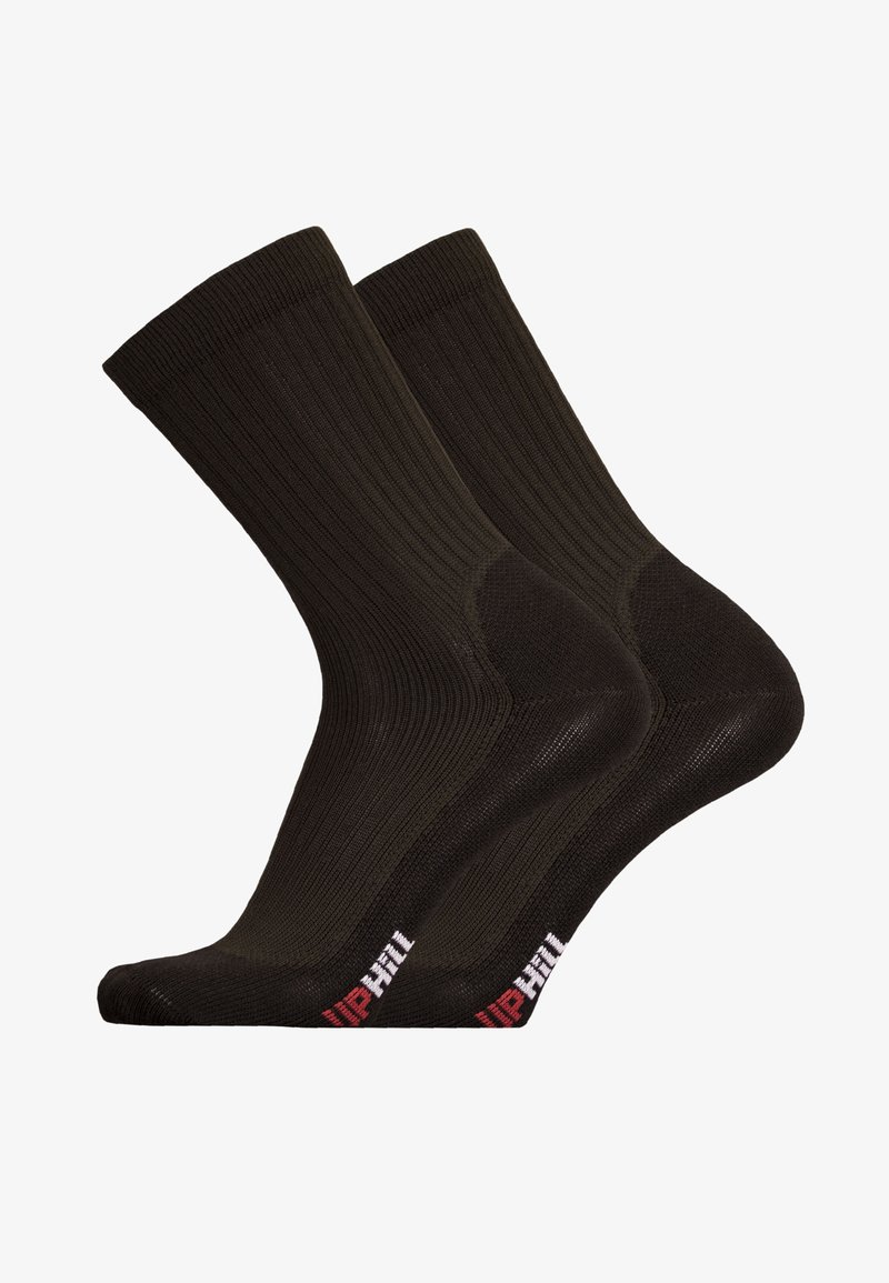 Black ribbed socks with a reinforced toe and heel, featuring small “UPHILL” text in red on the white accent near the cuff.