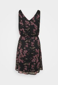 Svart blommig klänning med V-hals, kort svepande silhuett och elastisk midja, med lila och gröna blommönster på genomskinligt tyg.