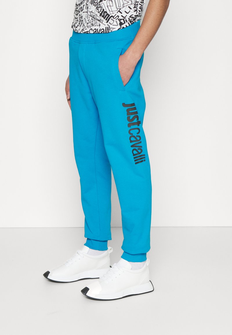 Just Cavalli Tracksuit bottoms hawaiian surf/blue Zalando.co.uk