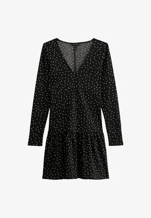 Abito nero con maniche lunghe, scollatura a V e pois bianchi. Orlo svasato con un tessuto testurizzato. Design semplice e moderno.