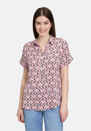 Camicetta a maniche corte in tessuto leggero con un motivo a onde rosa e nero, caratterizzata da un colletto e una chiusura con bottoni sul davanti.