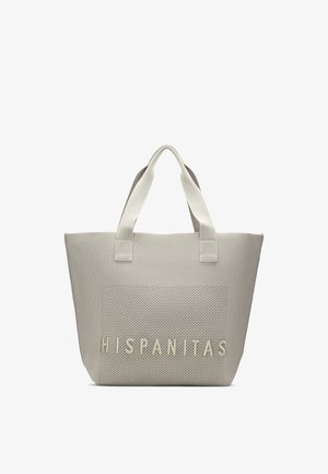 Borsa a spalla beige con pannello frontale strutturato caratterizzato da lettere "HISPANITAS" in rilievo e due manici robusti.