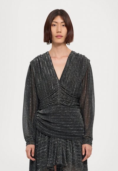 Black, textured long-sleeve dress with metallic threading, deep V-neck, and gathered details at the waist and sleeves. Flowy skirt accents.