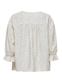 Blouse crème avec petit imprimé floral bleu, manches longues bouffantes avec poignets volantés et détail froncé sur le haut du dos.