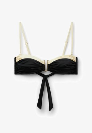 Haut de bikini noir et beige avec bretelles fines réglables, fermoir avant doré et détail noué noir pendant sous la poitrine.