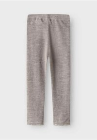 Grå leggings i texturerat tyg med ett subtilt mönster, elastisk midja och spetsdetalj vid fållen.