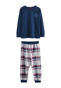 Haut à manches longues bleu marine avec inscription « New York », associé à un pantalon de pyjama à carreaux blanc, rouge et bleu marine avec taille élastique et jambes avec revers.