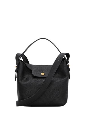 Black leather handbag with pebbled texture, flap closure with gold button, short handle, and adjustable shoulder strap shown on white background.