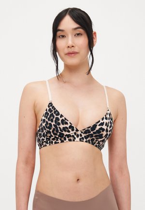 Luipaardprint bralette van zachte, rekbare stof; heeft een diepe halslijn en verstelbare dunne schouderbandjes. Makkelijk aanvoelende textuur en gedurfde print.