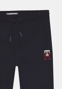 Tommy Hilfiger MONOGRAM UNISEX - Jogginghose - dark blue